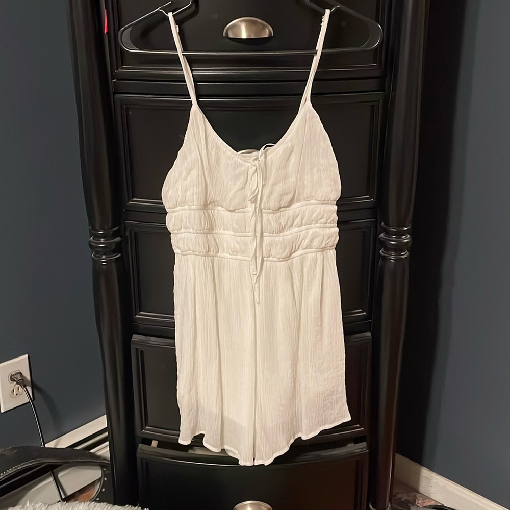 Cute white romper. Never worn.